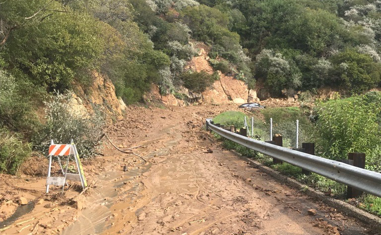 The access road to Gibraltar Peak was washed out by mudslides caused by heavy rainfall.