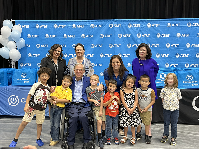 Gov. Greg Abbott and TX First Lady Cecilia Abbott with students and AT&T and Compudopt representatives, including President of AT&T Texas, Leslie Ward