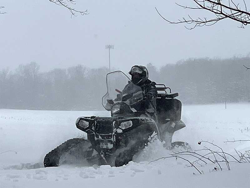 AT&T navigates winter conditions in Michigan, utilizing an ATV to restore critical site connectivity.
