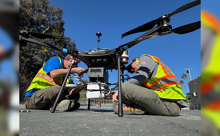 AT&T Drones & Robotics team prepares Flying COWs for launch.