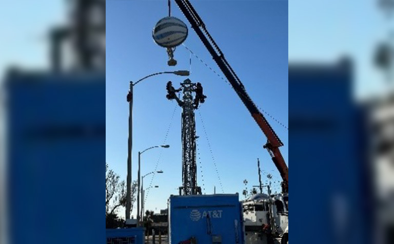 AT&T Network team members set up Super Cell on Wheels (SuperCOW).