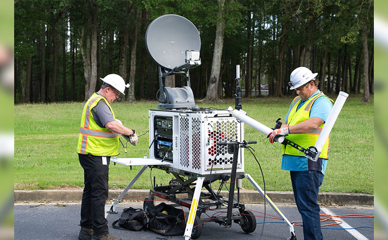 AT&T disaster response team members set up FirstNet Compact Rapid Deployable (CRD) in Spartanburg County, SC.