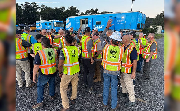 AT&T Disaster Recovery teams at basecamp morning briefing before deploying for restoration.