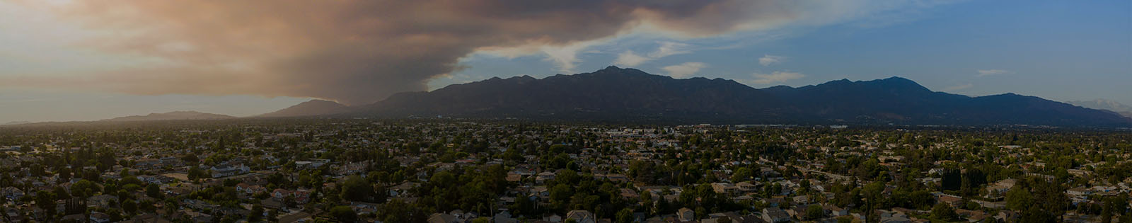 Sunny aerial view of big smoke cause by wildfire over Arcadia area.