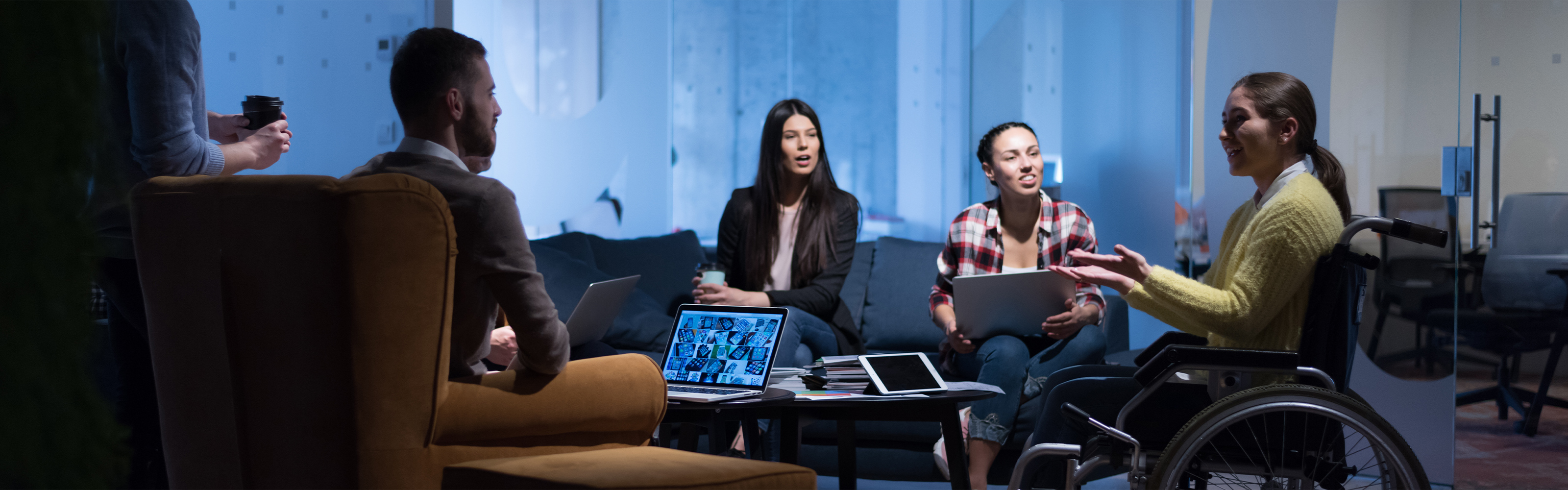 Group of coworkers meeting in an office setting 