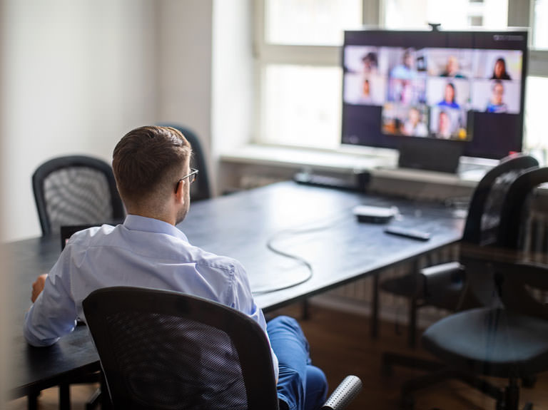 A man using a video conferencing system