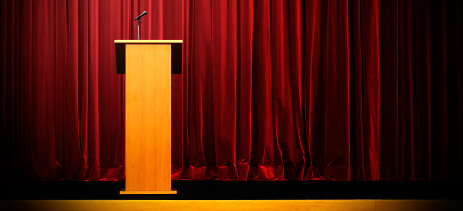 stage_podium_debate_election_946x432.jpg