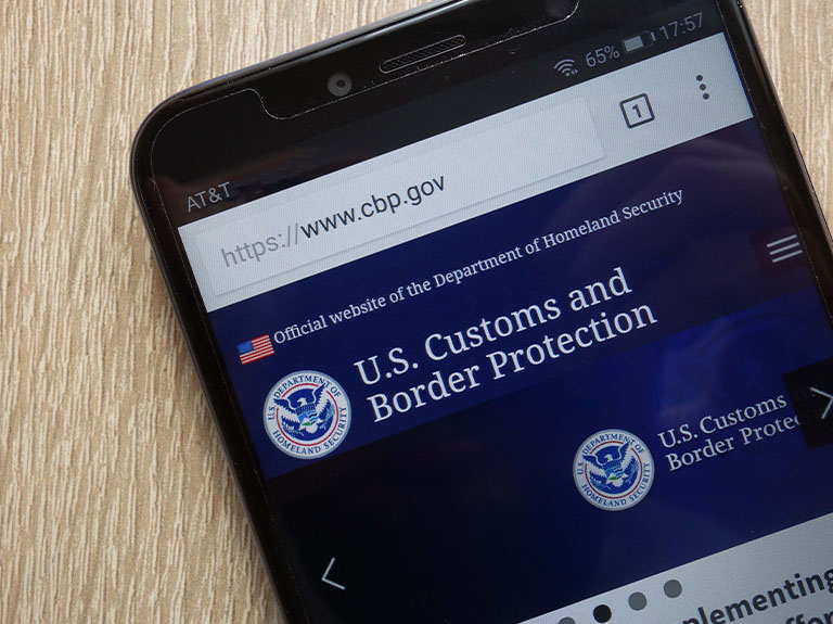 U.S. Customs and Border Protection website displayed on a modern smartphone.